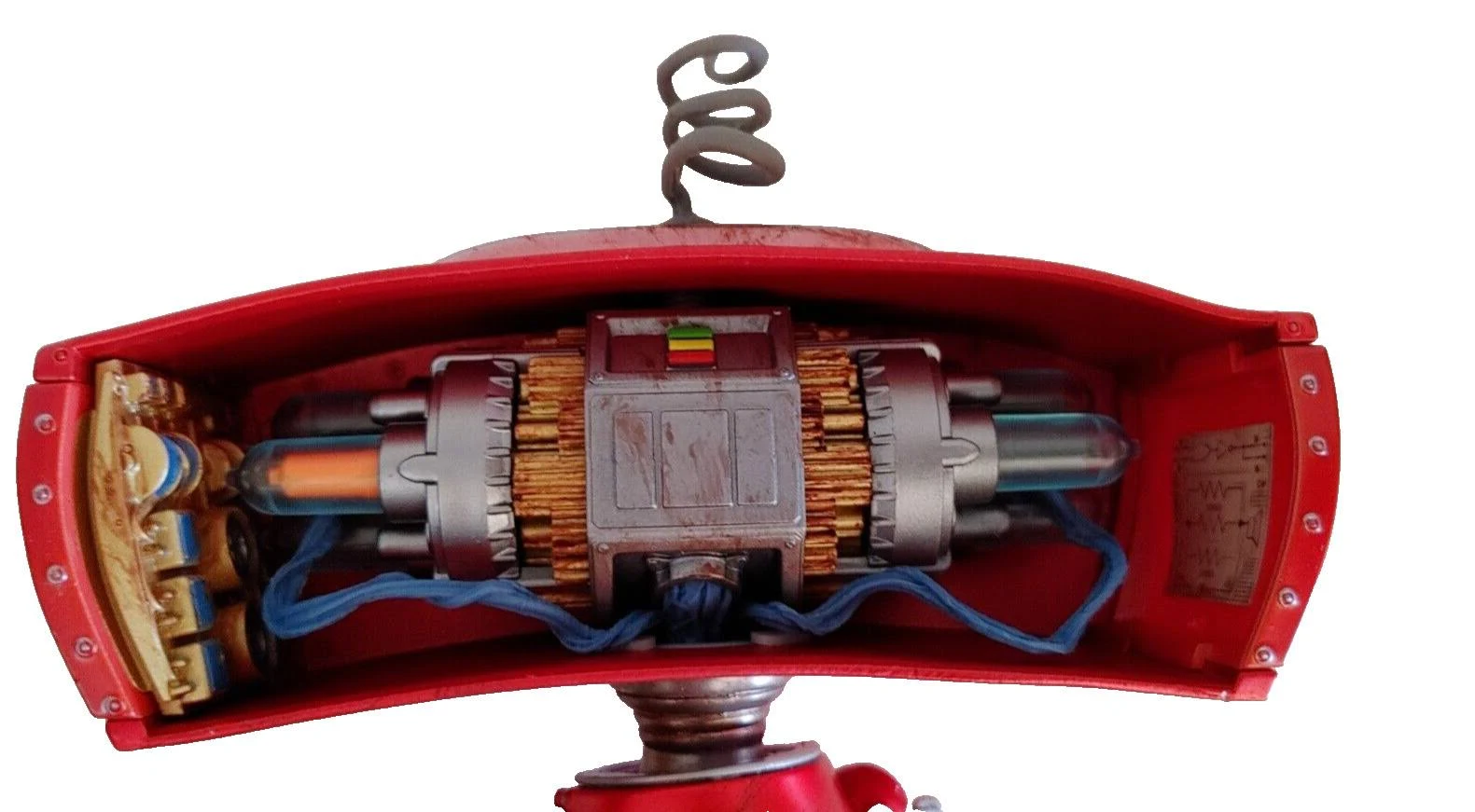 Cross-section view of the Bad Robot head revealing internal gears, vacuum tubes, wiring, and a sculpted mechanical brain